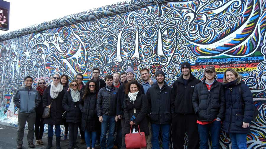 Students in front of a mural during Americans in Berlin trip