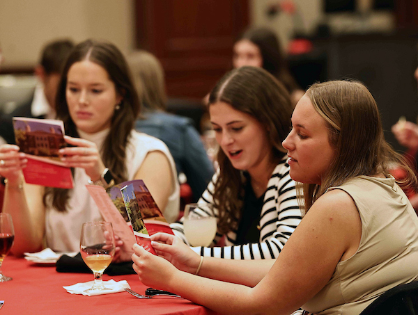 three students at a Political Science Student Award Ceremony