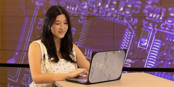 student working on a computer