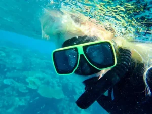 leah crowe snorking during an Australia trip in the Great Barrier Reef
