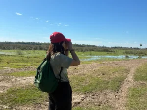 student taking pictures on an earth expedition course